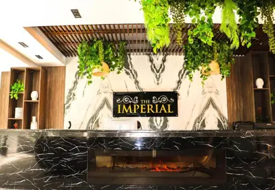 a lobby with a sign that reads the ego imperial at Hurghada - Apartment - Sleeps 6 - Pool - Parking in Hurghada