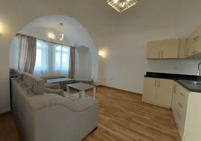 a living room with a couch and a table at Two Bedrooms at Kafr El-Gouna N14 in Hurghada
