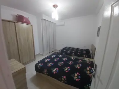 a bedroom with two beds in a room at شقة ٢ غرفة in Hurghada