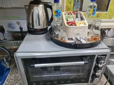 a blender sitting on top of a toaster oven at Hurghada appartment one room front of dream beach in Hurghada
