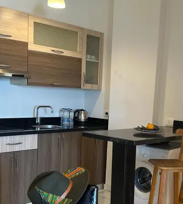 a kitchen with a sink and a counter top at My Sky Sea View 1 Bedroom Apartment in Hurghada