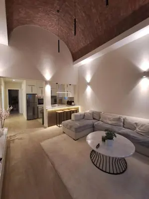 a living room with a couch and a table at Luxury in the heart of Gouna in Hurghada